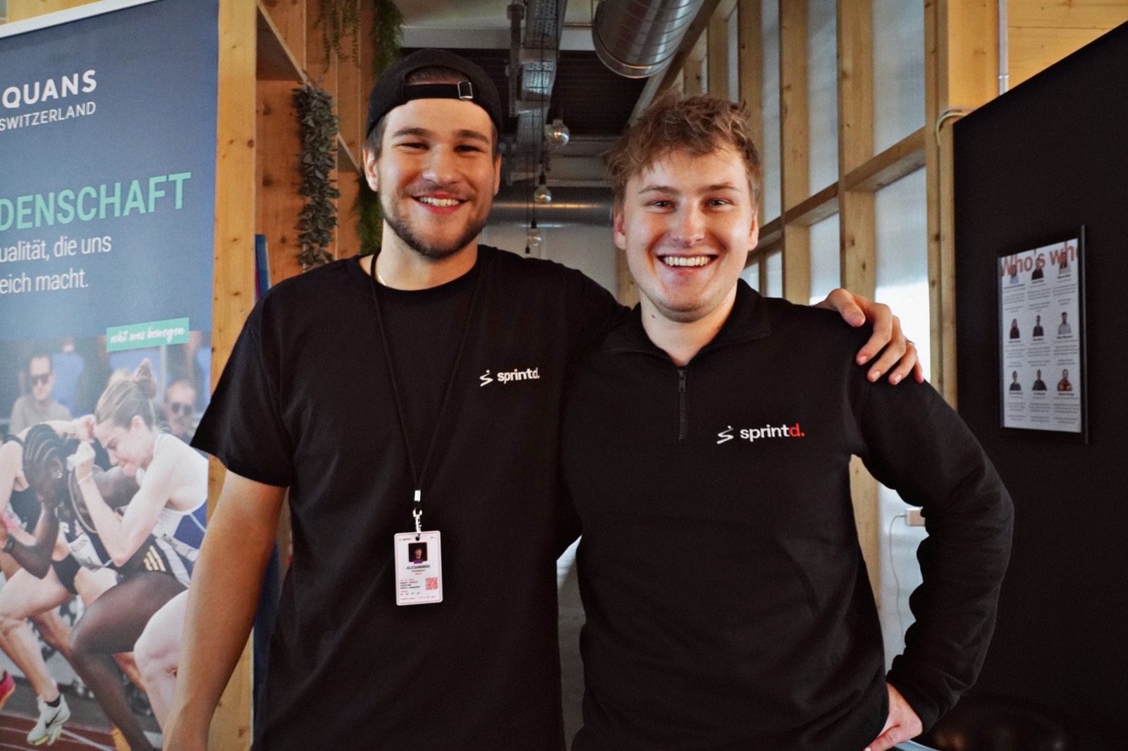 The two sprintd co-founders, arm in arm, smiling.