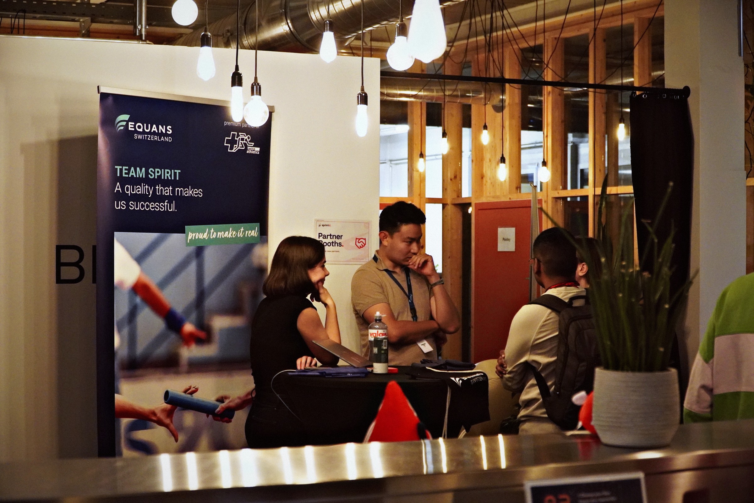 Someone sharing their experience with a team at their table during a sprint.